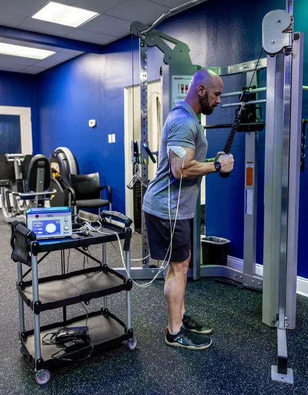 Chris doing cable pull with NXPro